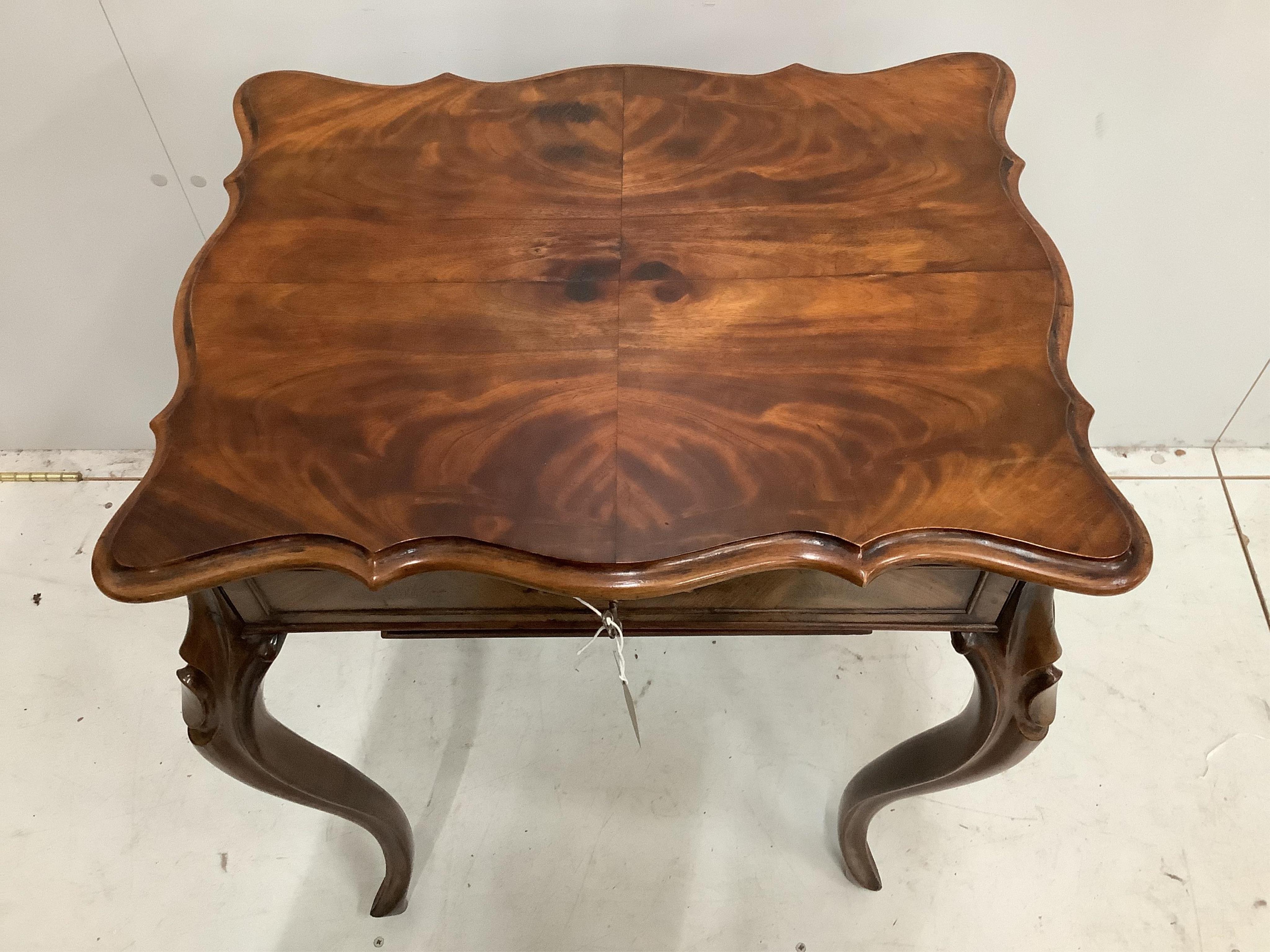 A 19th century French mahogany work table, with fitted interior and silks box, width 57cm, height 75cm. Condition - good